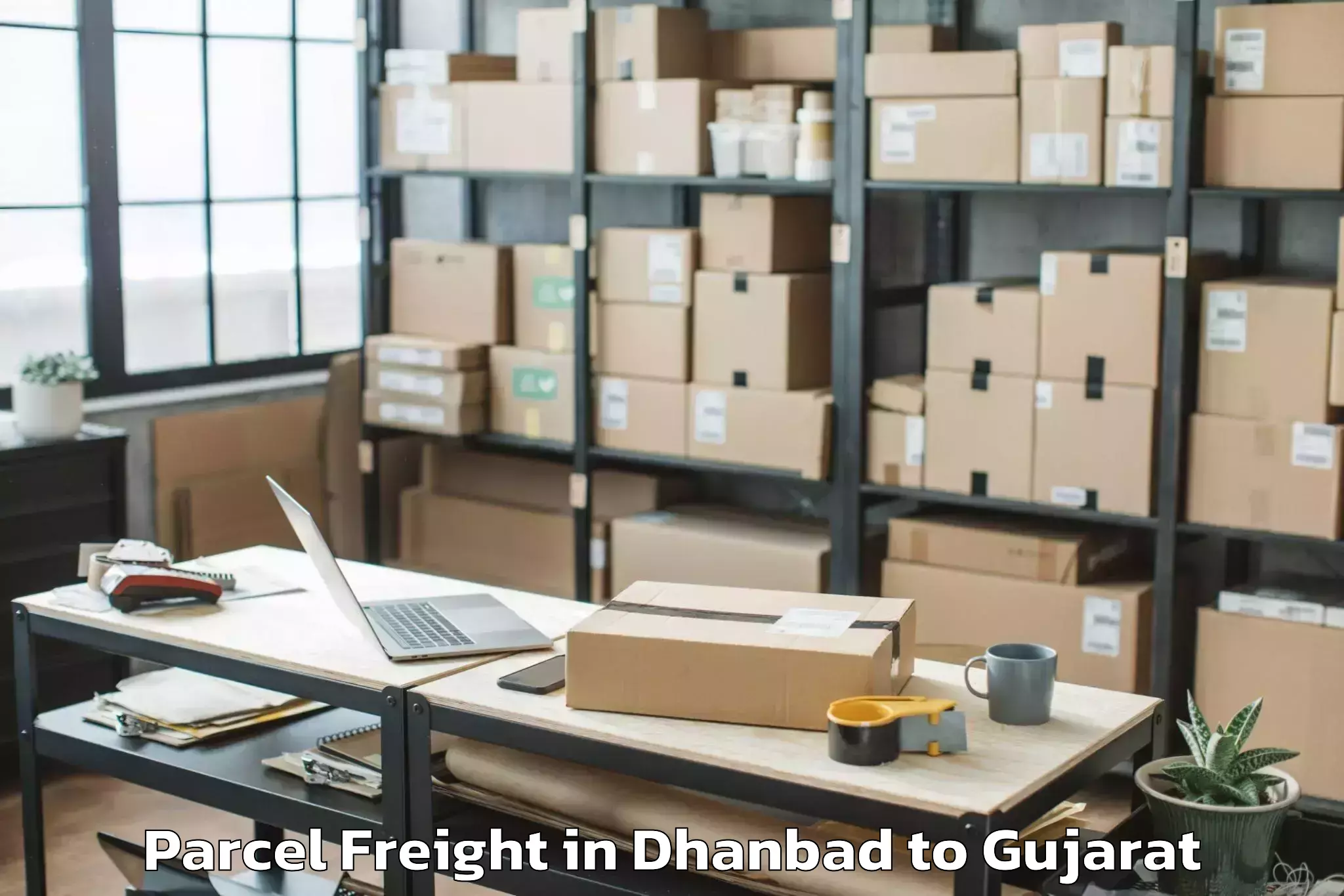 Easy Dhanbad to Anjar Parcel Freight Booking